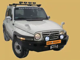 Бампер силовой передний SsangYong Korando/ТагАЗ Tager с ПТФ и площадкой под лебедку